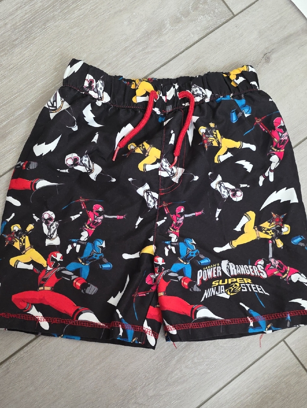 Power Ranger Kids Swim Trunks in Black with Red, Yellow, Blue
